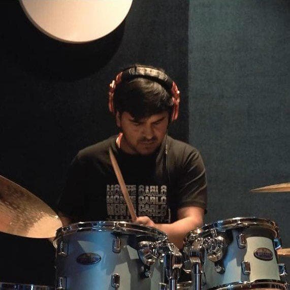 Founder playing drums